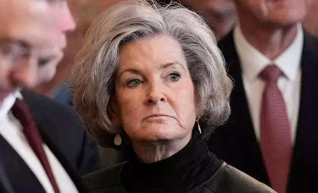 FILE - White House chief of staff Susie Wiles waits for the arrival of President Donald Trump for a Medal of Honor ceremony in the East Room of the White House, March 2, 2026, in Washington. (AP Photo/Mark Schiefelbein, FIle)