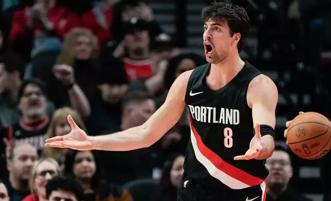 Portland Trail Blazers forward Deni Avdija reacts to a call during the first half of an NBA basketball game against the Brooklyn Nets, Monday, March 23, 2026, in Portland, Ore. (AP Photo/Jenny Kane)