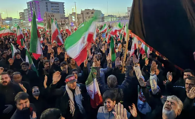 FILE - Government supporters gather in mourning after state TV announced the death of Iranian Supreme Leader Ayatollah Ali Khamenei, in Tehran, Iran, on March 1, 2026. (AP Photo/Vahid Salemi, File)