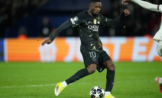PSG's Ousmane Dembele scores his side's second goal during the first leg of the Champions League round of 16 soccer match between Paris Saint-Germain and Chelsea, in Paris, Wednesday, March 11, 2026. (AP Photo/Michel Euler)