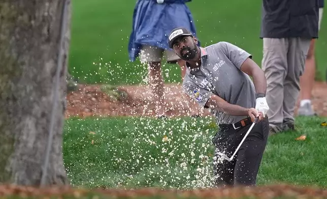 Sahith Theegala hits from the rough on the ninth hole during the first round of The Players Championship golf tournament Thursday, March 12, 2026, in Ponte Bedra Beach, Fla. (AP Photo/Gerald Herbert)