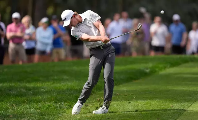Maverick McNealy hits a shot on the 10th hole during the first round of The Players Championship golf tournament Thursday, March 12, 2026, in Ponte Bedra Beach, Fla. (AP Photo/Gerald Herbert)