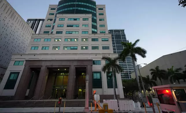 The sun rises outside the James Lawrence King Federal Building, where Secretary of State Marco was expected to testify in the trial of his former roommate David Rivera, Tuesday, March 24, 2026, in Miami. (AP Photo/Rebecca Blackwell)