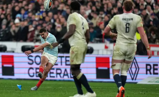 Thomas Ramos of France kicks the winning penalty during the Six Nations rugby union match between France and England in Saint-Denis, outside Paris, Saturday, March 14, 2026. (AP Photo/Michel Euler)