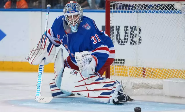 New York Rangers goaltender Igor Shesterkin (31) protects the net during the second period of an NHL hockey game against the Pittsburgh Penguins Saturday, Feb. 28, 2026, in New York. (AP Photo/Frank Franklin II)