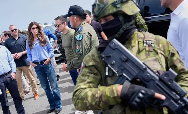 FILE - U.S. Homeland Security Secretary Kristi Noem speaks, accompanied by Ecuador's President Daniel Noboa, as she tours Ulpiano Paez Air Base, Nov. 6, 2025, in Salinas, Ecuador. (AP Photo/Alex Brandon, Pool, File)