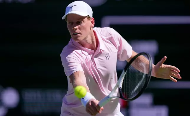 Jannik Sinner, of Italy, returns a shot against Learner Tien during a quarterfinal match at the BNP Paribas Open tennis tournament, Thursday, March 12, 2026, in Indian Wells, Calif. (AP Photo/Mark J. Terrill)