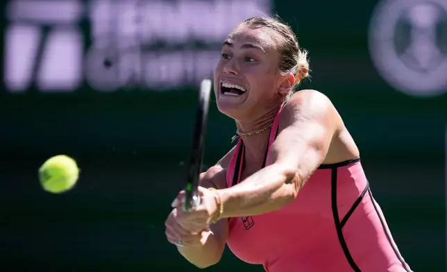 Aryna Sabalenka, of Belarus, returns a shot against Victoria Mboko, of Canada, during a quarterfinal match at the BNP Paribas Open tennis tournament, Thursday, March 12, 2026, in Indian Wells, Calif. (AP Photo/Mark J. Terrill)