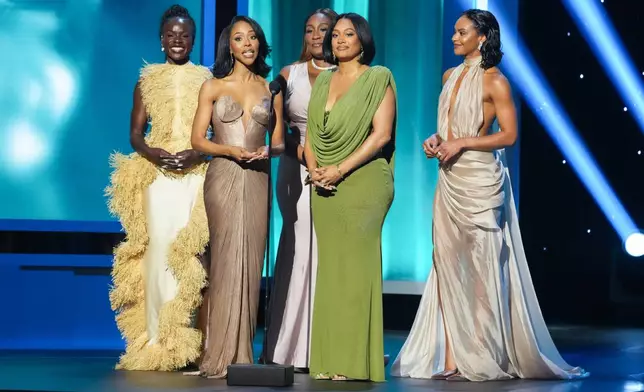 Tunde Oyeneyin, from left, KJ Smith Black, Mignon, Crystal Renee Hayslett and Jordan Coleman present the award for outstanding actress in a comedy series during the 57th NAACP Image Awards on Saturday, Feb. 28, 2026, in Pasadena, Calif. (AP Photo/Chris Pizzello)