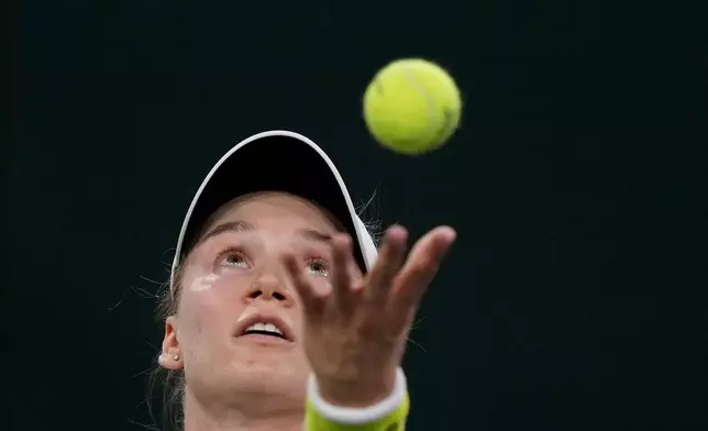 Elena Rybakina, of Kazakhstan, serves against Elina Svitolina, of Ukraine, during a semifinal match at the BNP Paribas Open tennis tournament, Friday, March 13, 2026, in Indian Wells, Calif. (AP Photo/Mark J. Terrill)