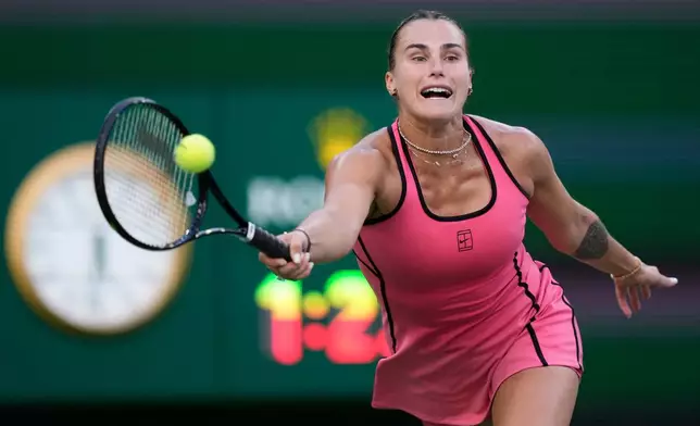 Aryna Sabalenka, of Belarus, returns a shot against Linda Noskova, of the Czech Republic, during a semifinal match at the BNP Paribas Open tennis tournament, Friday, March 13, 2026, in Indian Wells, Calif. (AP Photo/Mark J. Terrill)