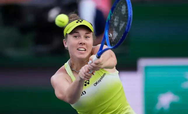 Linda Noskova, of the Czech Republic, returns a shot against Aryna Sabalenka, of Belarus, during a semifinal match at the BNP Paribas Open tennis tournament, Friday, March 13, 2026, in Indian Wells, Calif. (AP Photo/Mark J. Terrill)