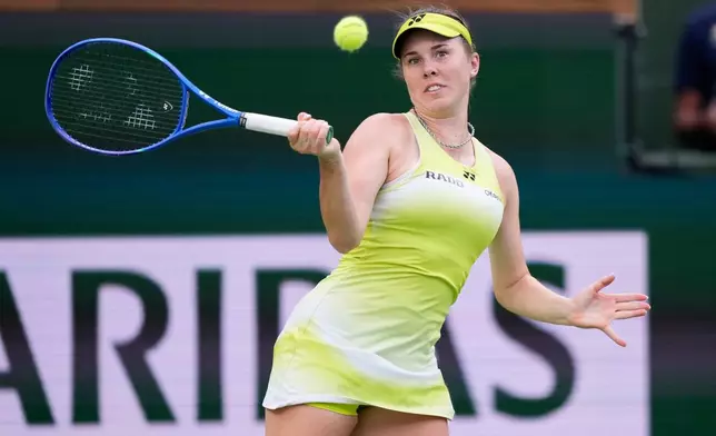 Linda Noskova, of the Czech Republic, returns a shot against Aryna Sabalenka, of Belarus, during a semifinal match at the BNP Paribas Open tennis tournament, Friday, March 13, 2026, in Indian Wells, Calif. (AP Photo/Mark J. Terrill)
