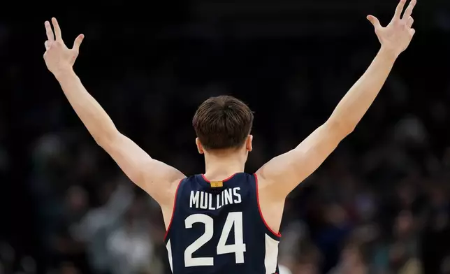 UConn guard Braylon Mullins celebrates his game-winning basket against Duke during the second half in the Elite Eight of the NCAA college basketball tournament, Sunday, March 29, 2026, in Washington. (AP Photo/Stephanie Scarbrough)