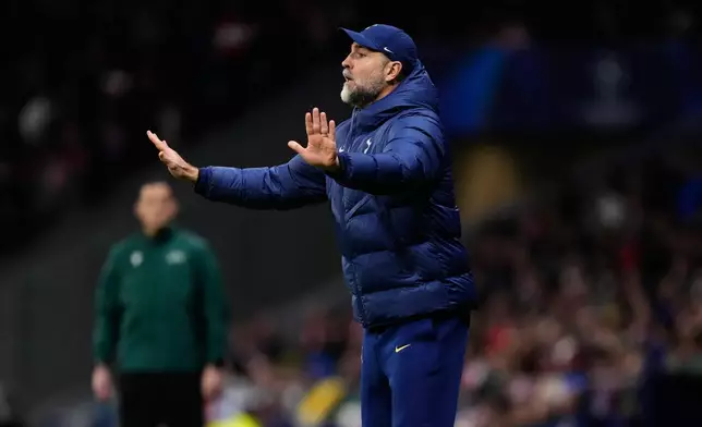 Tottenham's head coach Igor Tudor gives instructions to his players during the first leg of the Champions League round of 16 soccer match between Atletico Madrid and Tottenham in Madrid, Spain, Tuesday, March 10, 2026. (AP Photo/Jose Breton)