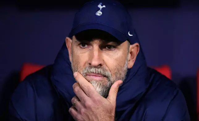 Tottenham's head coach Igor Tudor looks out from the bench prior to the first leg of the Champions League round of 16 soccer match between Atletico Madrid and Tottenham in Madrid, Spain, Tuesday, March 10, 2026. (AP Photo/Jose Breton)