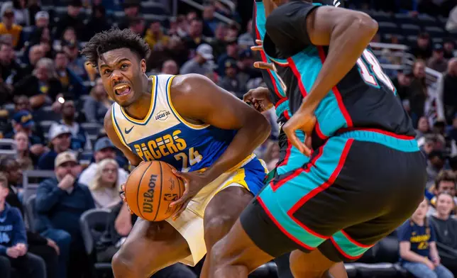 Indiana Pacers guard Kobe Brown (24) prepares to shoot during the second half of an NBA basketball game against the Memphis Grizzlies in Indianapolis, Sunday, March 1, 2026. (AP Photo/Doug McSchooler)