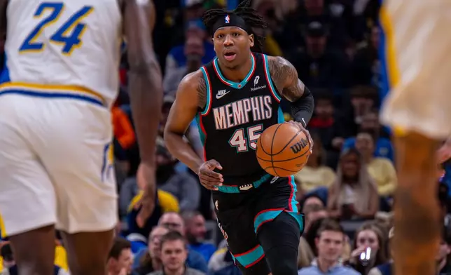 Memphis Grizzlies forward GG Jackson (45) brings the ball upcourt during the first half of an NBA basketball game against the Indiana Pacers in Indianapolis, Sunday, March 1, 2026. (AP Photo/Doug McSchooler)