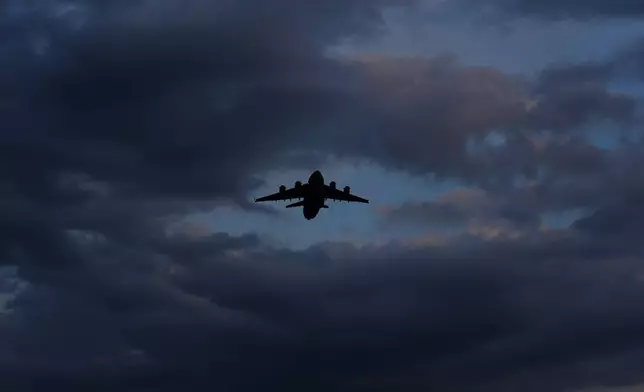 A transport aircraft takes off from the U.K.'s RAF Akrotiri air base near Limassol, Cyprus, Friday, March 6, 2026. (AP Photo/Petros Karadjias)