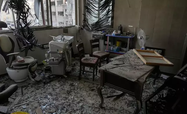 Debris is seen in a room of Gandhi Hospital, which was damaged when a strike hit a state TV communications tower and nearby buildings across the street, during the ongoing joint U.S.-Israeli military campaign in Tehran, Iran, Monday, March 2, 2026. (AP Photo/Vahid Salemi)