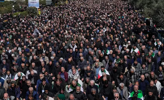 Iranians attend Friday prayers in the courtyard of the Imam Khomeini Grand mosque in Tehran, Iran, Friday, March 6, 2026. (AP Photo/Vahid Salemi)