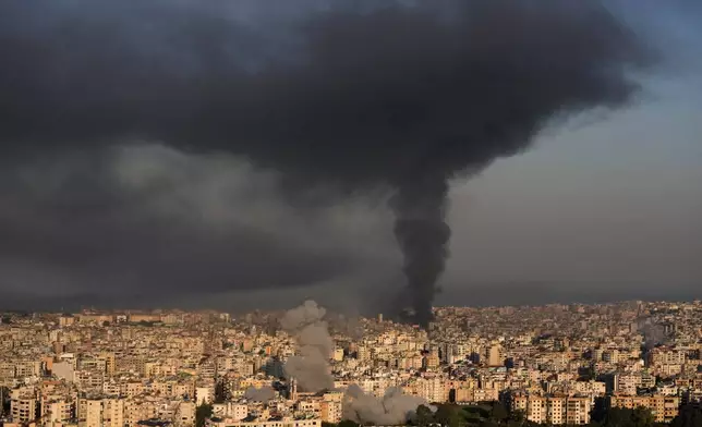 Smoke rises from Israeli airstrikes in Dahiyeh, a southern suburb of Beirut, Lebanon, Tuesday, March 3, 2026. (AP Photo/Hussein Malla)