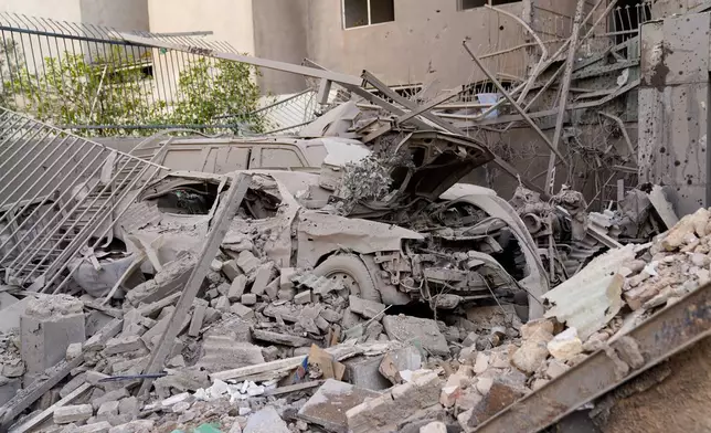 Ruins remain in the aftermath of an Israeli-U.S. strike in Tehran, Iran, Saturday, Feb. 28, 2026. (AP Photo/Amir Kholousi/ISNA)