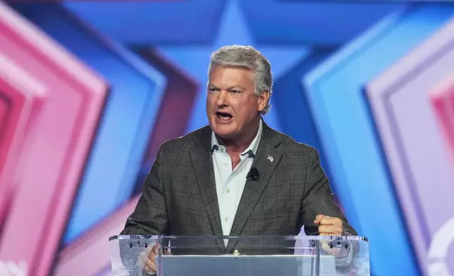 FILE - Rep. Mike Collins, R-Ga., speaks during Turning Point USA's AmericaFest 2025 on Dec. 20, 2025, in Phoenix. (AP Photo/Ross D. Franklin, File)