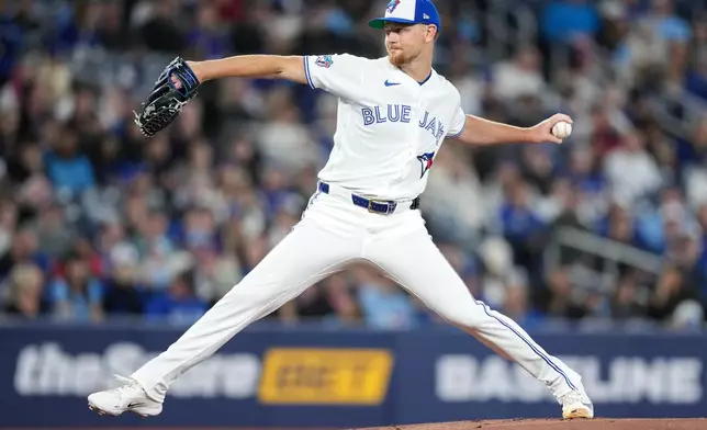 Toronto Blue Jays pitcher Eric Lauer (56) pitches against the Athletics during first inning American League baseball action in Toronto on Sunday, March 29, 2026. (Nathan Denette/The Canadian Press via AP)
