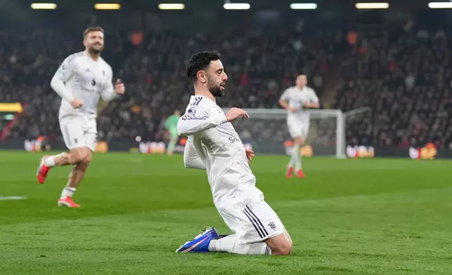 Manchester United's Bruno Fernandes celebrates scoring during an Premier League soccer match against AFC Bournemouth, Friday, March 20, 2026, in Bournemouth, England. (Andrew Matthews/PA via AP)