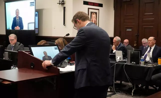 Defense Attorney Steve Grimes questions witness, Sen. Jon Husted , R-Ohio , as he testifies via Zoom during the trial of ex-FirstEnergy Senior Vice President Michael Dowling and former FirstEnergy CEO Chuck Jones resumes in Summit County Common Pleas Judge Susan Baker Ross's courtroom in Akron on March 11, 2026. (Mike Cardew /Akron Beacon Journal via AP, Pool)