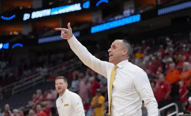 Iowa head coach Ben McCollum directs his players during the first half against Nebraska in the Sweet 16 of the NCAA college basketball tournament Thursday, March 26, 2026, in Houston. (AP Photo/Eric Gay)
