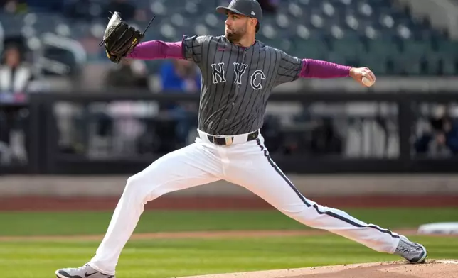 New York Mets' pitcher David Peterson (23) throws during the first inning of a baseball game against the Pittsburgh Pirates, Saturday, March 28, 2026, in New York. (AP Photo/Yuki Iwamura)