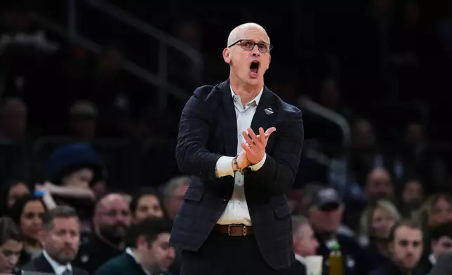 UConn head coach Dan Hurley calls out to his team during first half of an NCAA college basketball game against Xavier in the quarterfinals of the Big East basketball tournament Thursday, March 12, 2026, in New York. (AP Photo/Frank Franklin II)