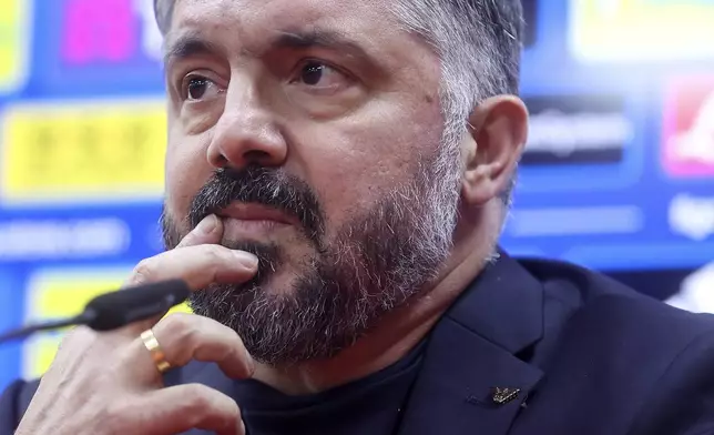 Italy's head coach Gennaro Gattuso listens to the questions of journalists during the press conference ahead of the World Cup playoff final soccer match against Bosnia in Zenica, Bosnia, Monday, March 30, 2026. (AP Photo/Armin Durgut)