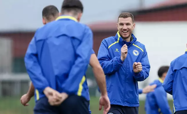 Bosnia's captain Edin Dzeko gestures during the training session ahead of the World Cup playoff final soccer match against Italy, at the Butmir training centre, in Sarajevo, Bosnia, Monday, March 30, 2026. (AP Photo/Armin Durgut)