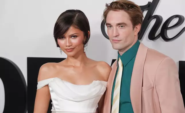 Zendaya, left, and Robert Pattinson arrive at the premiere of "The Drama" on Tuesday, March 17, 2026, at DGA Theater Complex in Los Angeles. (AP Photo/Chris Pizzello)