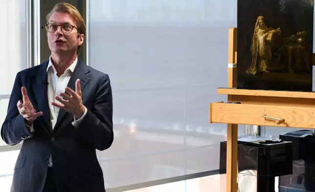 Director Taco Dibbits of the Rijksmuseum unveiled the work "Vision of Zacharias in the Temple" during a press preview in Amsterdam, Netherlands, Monday, March 2, 2026 and said two years of analysis has confirmed it was painted by Rembrandt. (AP Photo/Peter Dejong)