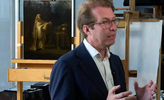 Director Taco Dibbits of the Rijksmuseum unveiled the work "Vision of Zacharias in the Temple" during a press preview in Amsterdam, Netherlands, Monday, March 2, 2026 and said two years of analysis has confirmed it was painted by Rembrandt. (AP Photo/Peter Dejong)
