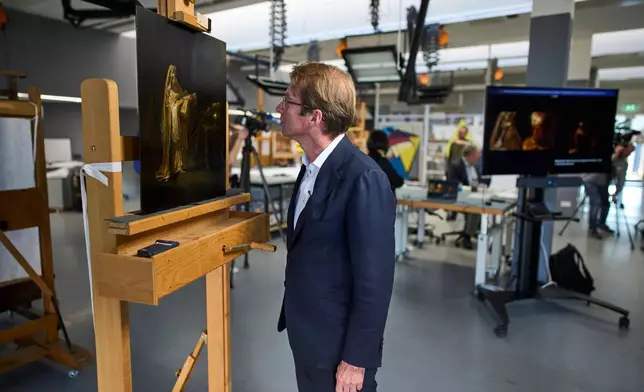 Director Taco Dibbits of the Rijksmuseum unveiled the work "Vision of Zacharias in the Temple" during a press preview in Amsterdam, Netherlands, Monday, March 2, 2026 and said two years of analysis has confirmed it was painted by Rembrandt. (AP Photo/Peter Dejong)