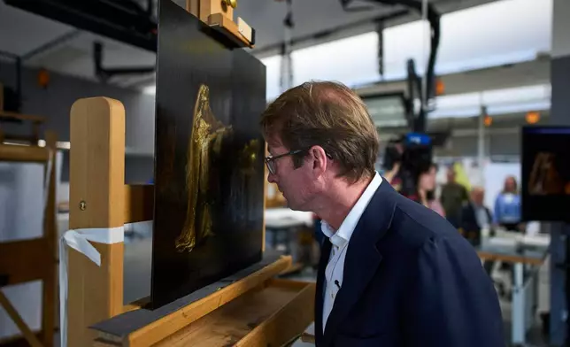 Director Taco Dibbits of the Rijksmuseum unveiled the work "Vision of Zacharias in the Temple" during a press preview in Amsterdam, Netherlands, Monday, March 2, 2026 and said two years of analysis has confirmed it was painted by Rembrandt. (AP Photo/Peter Dejong)