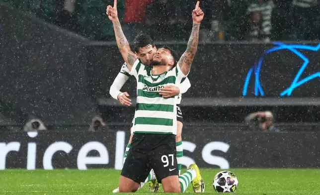 Sporting's Luis Suarez celebrates after scoring his side's third goal during a Champions League round of 16 second leg soccer match between Sporting CP and Bodo Glimt in Lisbon, Portugal, Tuesday, March 17, 2026. (AP Photo/Ana Brigida)
