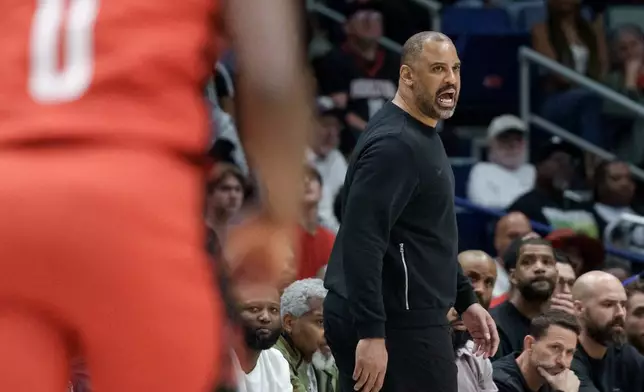 Houston Rockets head coach Ime Udoka reacts during the first half against the New Orleans Pelicans of an NBA basketball game in New Orleans, Sunday, March 29, 2026. (AP Photo/Matthew Hinton)