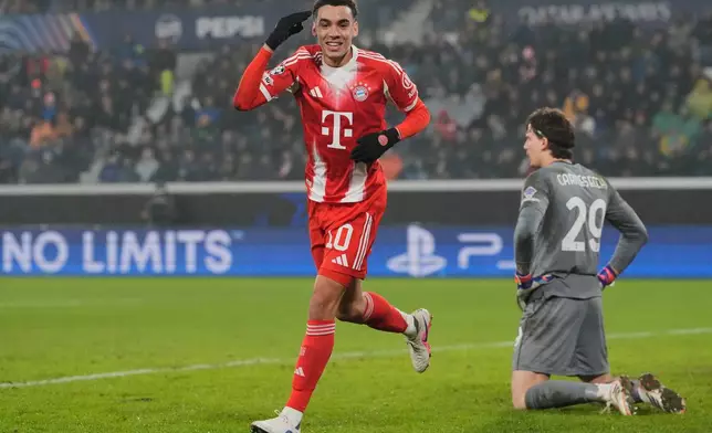 Bayern's Jamal Musiala celebrates after scoring his side's sixth goal during the Champions League round of 16 soccer match between Atalanta and FC Bayern Munich in Bergamo, Italy, Tuesday, March 10, 2026. (AP Photo/Luca Bruno)