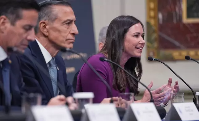 Sen. Katie Britt, R-Ala., addresses President Donald Trump during an event about the Ratepayer Protection Pledge, in the Indian Treaty Room of the Eisenhower Executive Office Building on the White House complex, Wednesday, March 4, 2026, in Washington. (AP Photo/Jacquelyn Martin)