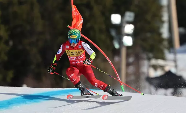 Austria's Julia Scheib speeds down the course during a women's World Cup giant slalom, in Are, Sweden, Saturday, March 14, 2026. (AP Photo/Marco Trovati)