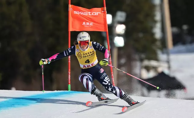 United States' Paula Moltzan speeds down the course during a women's World Cup giant slalom, in Are, Sweden, Saturday, March 14, 2026. (AP Photo/Marco Trovati)
