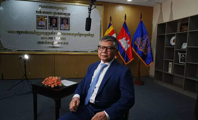 Senior Minister Chhay Sinarith, who is in charge of the Commission for Combating Online Scams, speaks to the Associated Press in Phnom Penh, Cambodia, Wednesday, March 11, 2026. (AP Photo/Heng Sinith)