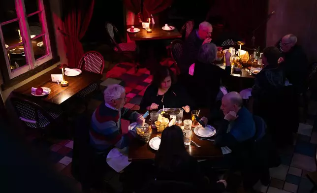 Diners eat at Cuba Libre Restaurant and Rum Bar in Philadelphia, on Friday, March 6, 2026. (AP Photo/Mingson Lau)