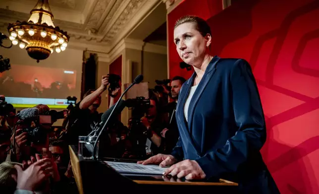 Denmark's Prime Minister and chairperson of the Social Democrats, Mette Frederiksen, speaks during the election celebration in the Common Hall at Christiansborg, in Copenhagen, early Wednesday, March 25, 2026. (Mads Claus Rasmussen/Ritzau Scanpix via AP)